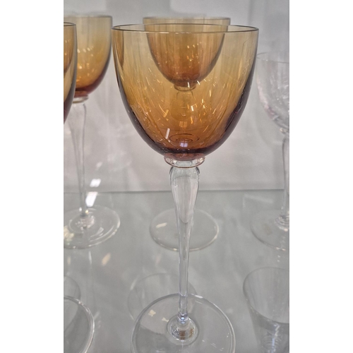 43 - SAINT LOUIS DRINKING GLASSES, comprising eight clear wine glasses, 20.5cm H and eight amber coloured... 