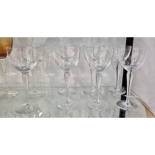 43 - SAINT LOUIS DRINKING GLASSES, comprising eight clear wine glasses, 20.5cm H and eight amber coloured... 