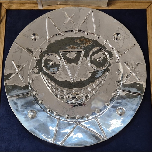 68 - PABLO PICASSO, 'Horloge a la langue', 1956, repoussé silver, 42cm diam, stamped verso. (Subject to A... 