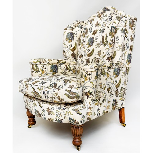 495 - WING ARMCHAIR, early 20th century with foliate tapestry style, with reeded and turned oak front supp... 