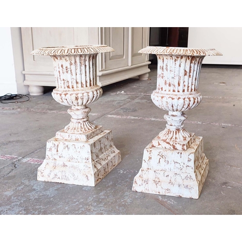 359 - URNS, a pair, Victorian style, cast metal, on pedestal bases, 53cm H. (2)