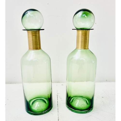 367 - DECANTERS, a pair, Murano style glass, with gilt metal collars, 52cm x 16cm x 16cm.