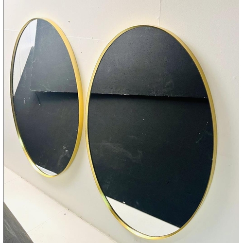 368 - OVAL WALL MIRRORS, a pair, gilt metal frames, 110cm x 75cm.