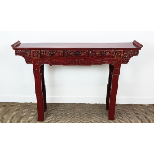 184 - ALTAR TABLE, Chinese red lacquer with carved detail and three drawers, 29cm D x 110cm H x 158cm W.