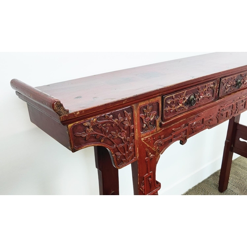 184 - ALTAR TABLE, Chinese red lacquer with carved detail and three drawers, 29cm D x 110cm H x 158cm W.