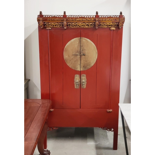 185 - CHINESE MARRIAGE CABINET, 101cm x 70cm D x 180cm H, red lacquer with carved and gilded fretwork deta... 