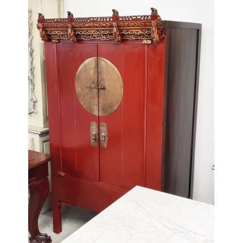 185 - CHINESE MARRIAGE CABINET, 101cm x 70cm D x 180cm H, red lacquer with carved and gilded fretwork deta... 