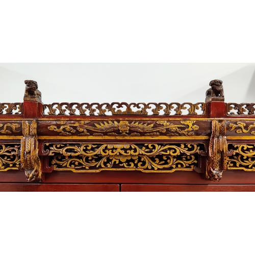 185 - CHINESE MARRIAGE CABINET, 101cm x 70cm D x 180cm H, red lacquer with carved and gilded fretwork deta... 