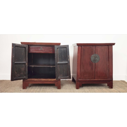 192 - SIDE CABINETS, a pair, Chinese lacquered, each with two doors enclosing a drawer and shelf, 75cm H x... 