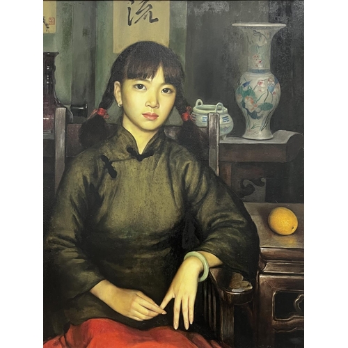 73 - ZHANG YIZHI (20th century Chinese), 'Seated Lady', oil on canvas, signed and dated 1991, 99cm x 80cm... 