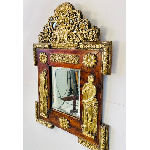 498 - WALL MIRROR, late 19th/early 20th century Dutch, with bevelled plate within wooden frame and repouss... 