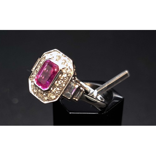 59 - ART DECO STYLE PLATINUM PINK SAPPHIRE AND DIAMOND DRESS RING, the step cut central sapphire surround... 