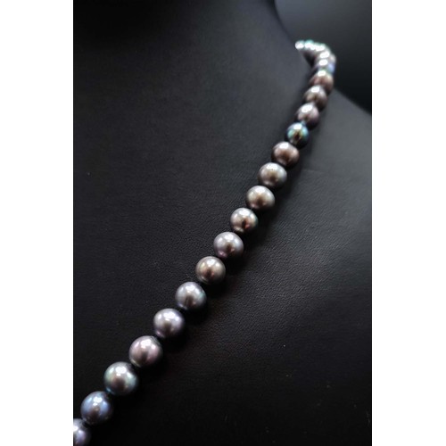 60 - GREY CULTURED PEARL NECKLACE, diamond set bow and tear drop pendant, the diamonds of approximately 1... 