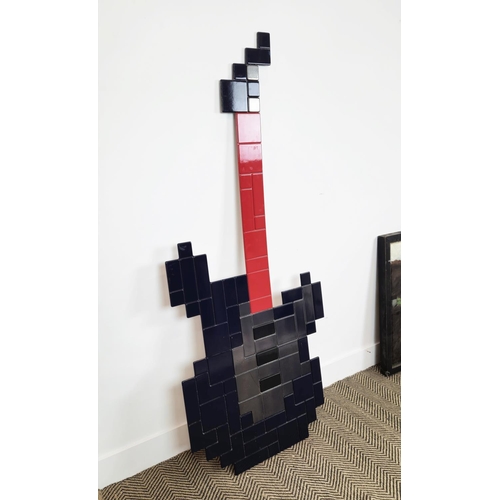 506 - SHOP WALL DISPLAY, in the form of a guitar, 150cm x 65cm.