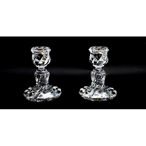 28 - BACCARAT CRYSTAL 'BAMBOO' TYPE CANDLE HOLDERS, a pair, Wrythen decoration, signed to bases, 16cm H. ... 