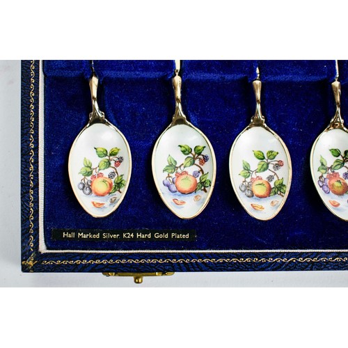 24 - BOXED ENAMEL AND SILVER GILT TEA SPOONS, from Thomas Goode and Co Ltd.