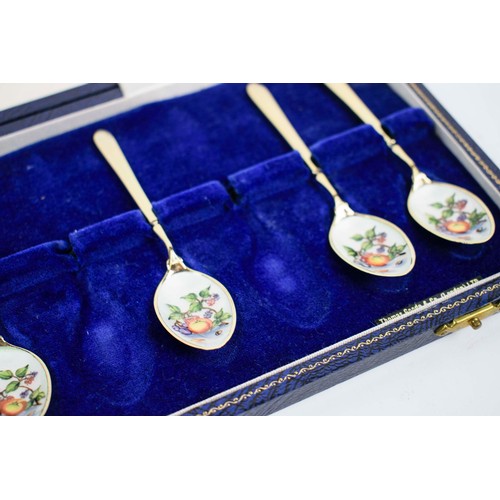 24 - BOXED ENAMEL AND SILVER GILT TEA SPOONS, from Thomas Goode and Co Ltd.