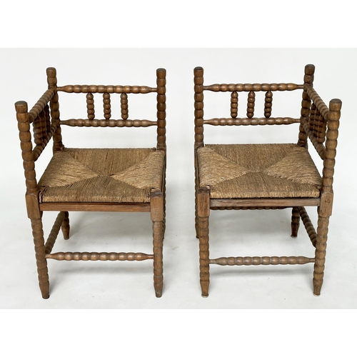 165 - CORNER CHAIRS, a pair, late 19th century oak bobbin turned with rush seats, 59cm W. (2)