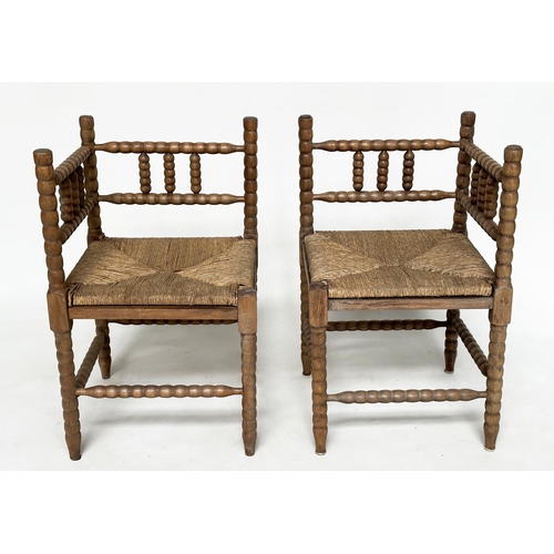 165 - CORNER CHAIRS, a pair, late 19th century oak bobbin turned with rush seats, 59cm W. (2)