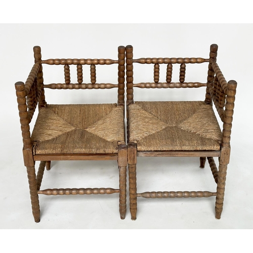 165 - CORNER CHAIRS, a pair, late 19th century oak bobbin turned with rush seats, 59cm W. (2)