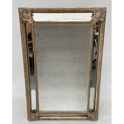 155 - WALL MIRROR, 19th century French giltwood and gesso moulded, rectangular bevelled mirror with cushio... 