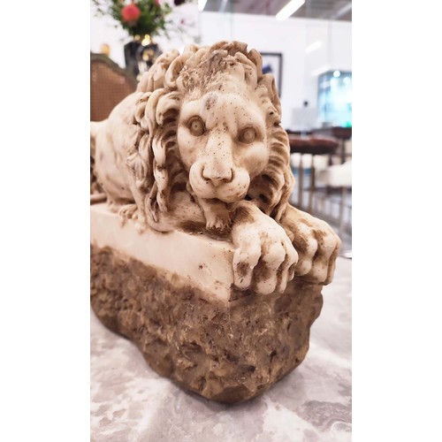 53 - REZZONICO LIONS AFTER CANOVA, a pair, simulated marble of recent manufacture, 22cm H x 10cm W x 29cm... 