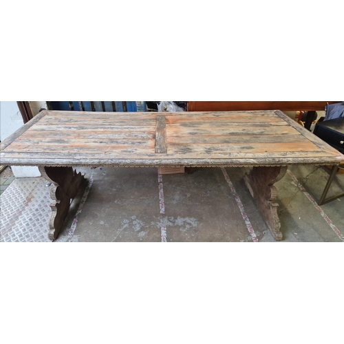 511 - TUSCAN FARMHOUSE TABLE, carved walnut dolphin design base with a planked top, 79cm H x 249cm x 101cm... 