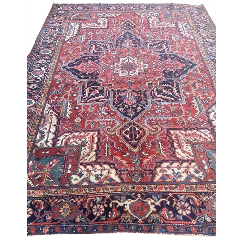 116 - ANTIQUE PERSIAN HERIZ CARPET, 310cm x 230cm.