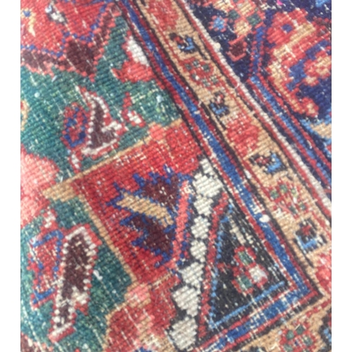 116 - ANTIQUE PERSIAN HERIZ CARPET, 310cm x 230cm.