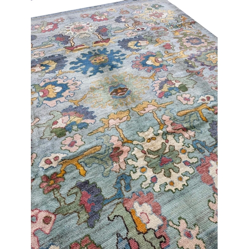 104 - FINE PERSIAN OUSHAK DESIGN CARPET, 335cm x 304cm.