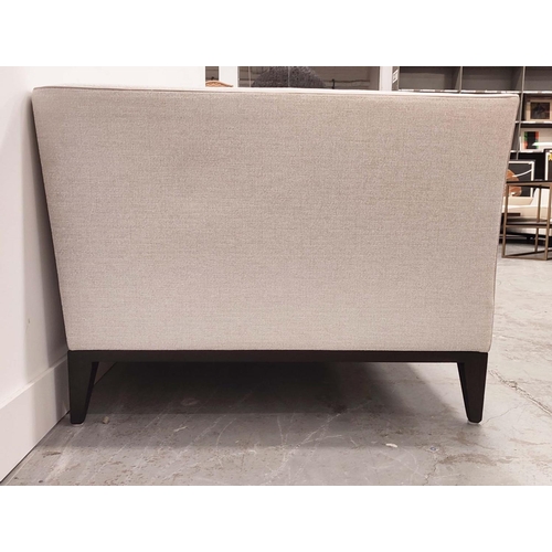 404 - SOFA, in a stone coloured flecked fabric, 177cm W x 68cm H x 90cm D.