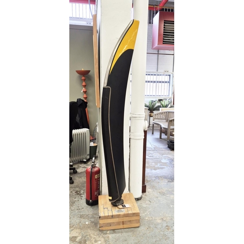 409 - PROPELLER ON STAND, carbon fibre and aluminium on wood, 191cm H.