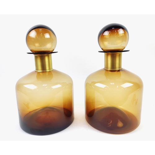 399 - DECANTERS, a pair, amber coloured Murano style glass, 38cm H x 22cm W. (2)