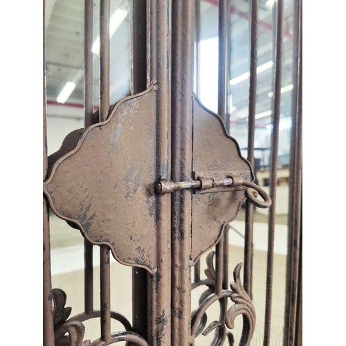 326 - ARCHITECTURAL WALL MIRRORS, a pair, with metal gated frames, 130cm H x 51cm. (2)