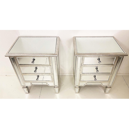 418 - SIDE CHESTS, a pair, Venetian style, mirrored finish with silvered accents, 60cm x 50cm x 40cm. (2)