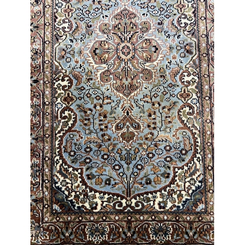 126 - INDIAN TABRIZ DESIGN WOOL AND SILK RUG, 158cm x 91cm.