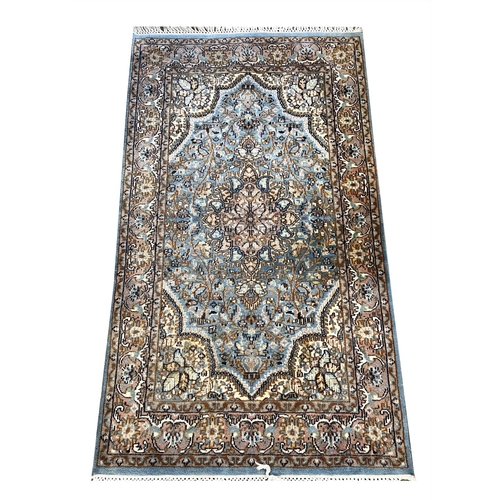 127 - INDIAN TABRIZ DESIGN WOOL AND SILK RUG, 162cm x 93cm.