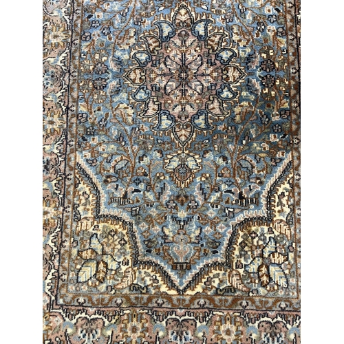 127 - INDIAN TABRIZ DESIGN WOOL AND SILK RUG, 162cm x 93cm.