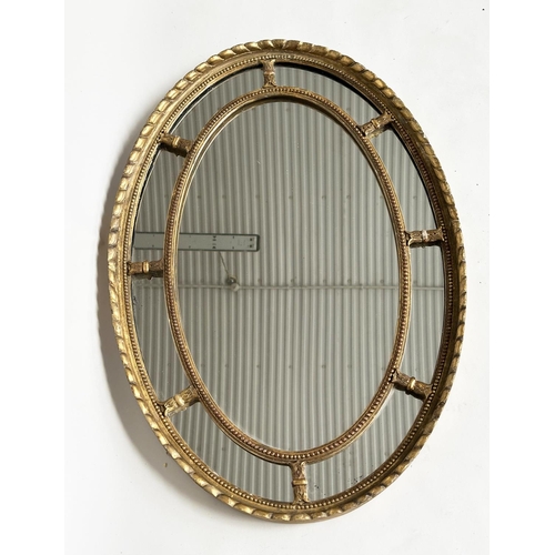 136 - WALL MIRROR, 19th century George III design oval giltwood and gesso with beaded frame and marginal p... 