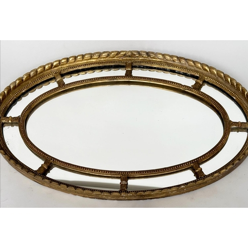 136 - WALL MIRROR, 19th century George III design oval giltwood and gesso with beaded frame and marginal p... 