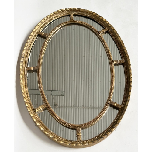 136 - WALL MIRROR, 19th century George III design oval giltwood and gesso with beaded frame and marginal p... 