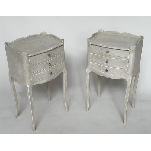 144 - BEDSIDE CHESTS, a pair, French Louis XV style grey painted, each serpentine fronted with three drawe... 