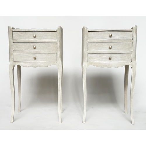 144 - BEDSIDE CHESTS, a pair, French Louis XV style grey painted, each serpentine fronted with three drawe... 