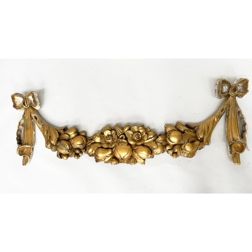 151 - ARCHITECTURAL WALL MOUNT, early 19th century Italian carved giltwood of swag form with pineapple and... 