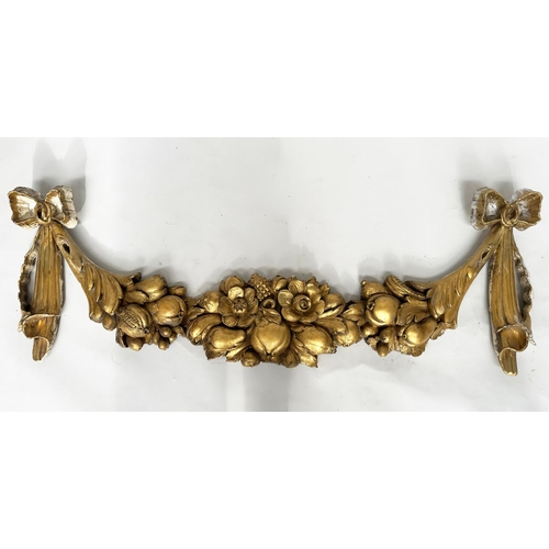 151 - ARCHITECTURAL WALL MOUNT, early 19th century Italian carved giltwood of swag form with pineapple and... 