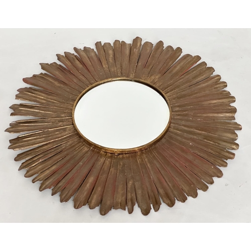 152 - WALL MIRROR, circular bevelled with radiating starburst gilt metal frame, 60cm W.