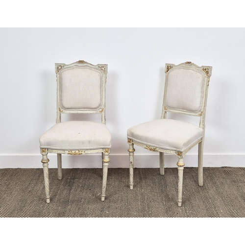 169 - SIDE CHAIRS, a pair, late 19th/early 20th century French painted and gilt heightened in taupe fabric... 