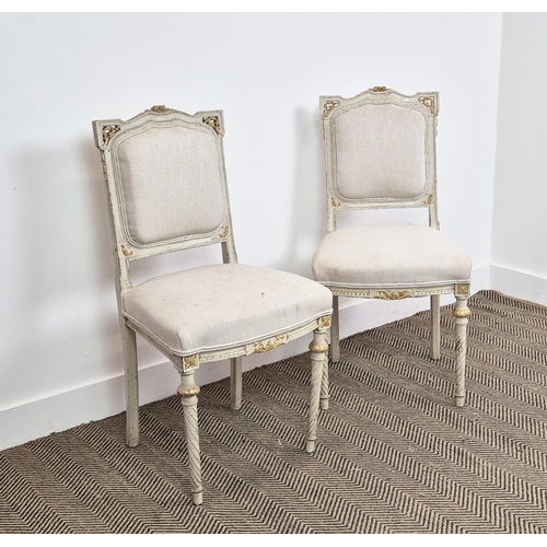 169 - SIDE CHAIRS, a pair, late 19th/early 20th century French painted and gilt heightened in taupe fabric... 