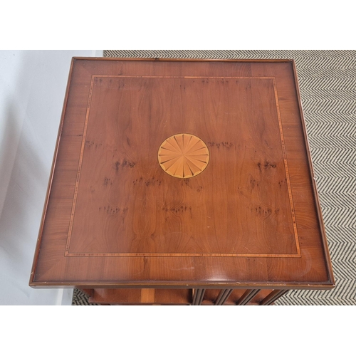 172 - REVOLVING BOOKCASE, yew wood with medallion inlaid top on castors, 78cm H x 50cm x 50cm.