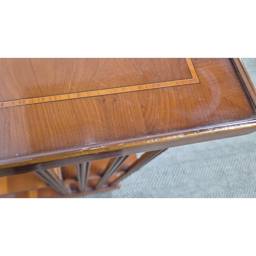 172 - REVOLVING BOOKCASE, yew wood with medallion inlaid top on castors, 78cm H x 50cm x 50cm.